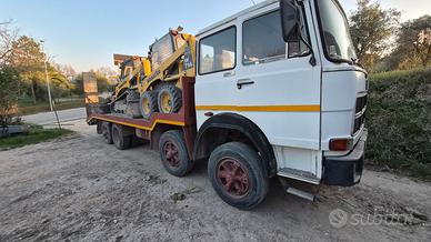 camion carrellone con rampe patente B