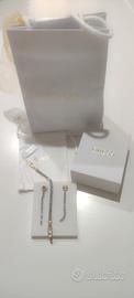 set gioielli Guess bracciale e orecchini pendenti 