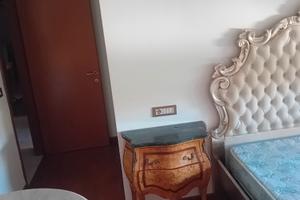 Camera singola grande con letto matrimoniale