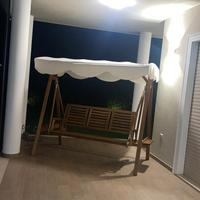 Dondolo tre posti in legno