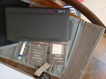 Atari Portfolio + memory card + custodia