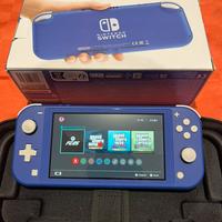 Nintendo switch lite + cover + giochi