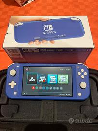 Nintendo switch lite + cover + giochi