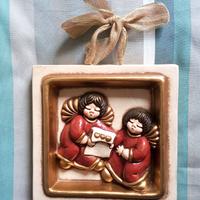 Formella grande con angeli Thun