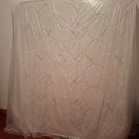 Rete con doghe e materasso matrimoniale