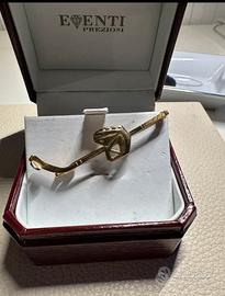 Spilla Hockey Ghiaccio Oro giallo/ bianco 18ct.