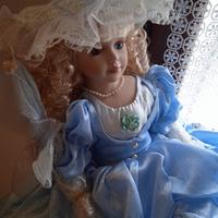 Bambola in ceramica come nuova