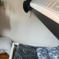 Letto una piazza e mezzo bianco . Testata imbottit