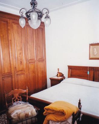 Camera da letto massello noce