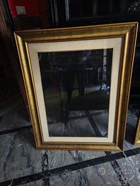 cornice in legno dorato