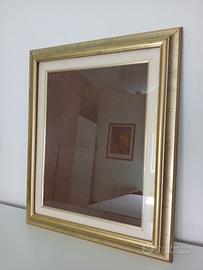 cornice dorata in legno per quadro
