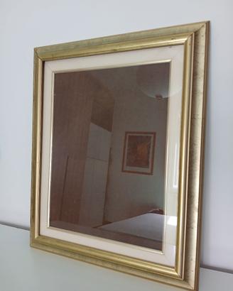 cornice dorata in legno per quadro