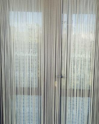 Tenda a fili antimosche
