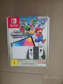 Nintendo Switch OLED + 4 Joy‑Con originali + gioco