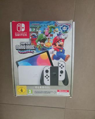 Nintendo Switch OLED + 4 Joy‑Con originali + gioco