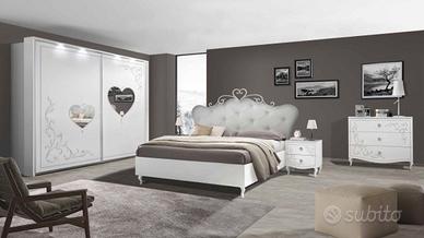 Camera da letto con letto contenitore