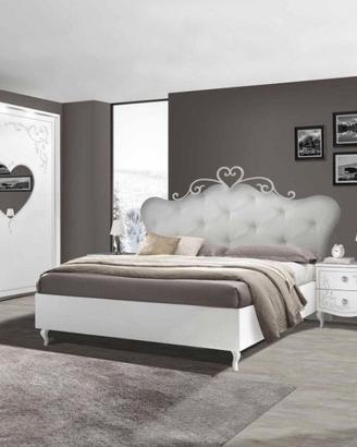 Camera da letto con letto contenitore