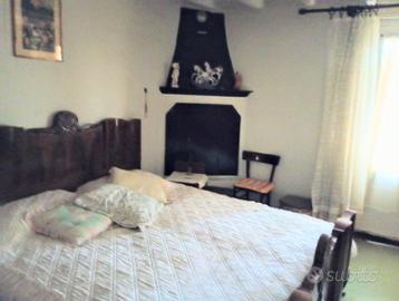 Terra tetto unifamiliare con ampio giardino e box