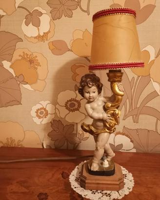 Piccola abat-jour vintage raffigurante un putto