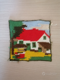 Ricamo a canovaccio su tela