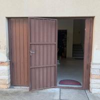 Portone basculante per garage