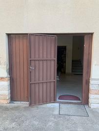 Portone basculante per garage