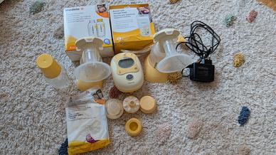 Medela tiralatte con accessori 