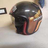Casco AGV integrale e casco jet aerografato carbon
