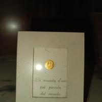 Moneta d'oro più piccola al mondo 