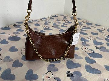 Borsa a spalla color bordeaux Coach.