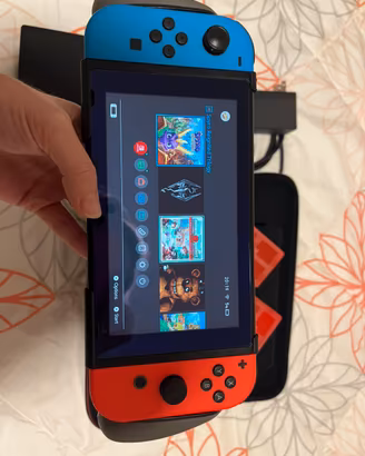 Nintendo Switch V2 + Grip & Custodia