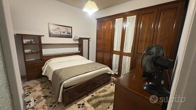 camera da letto in legno massello 