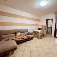 Trilocale con terrazza e posto auto