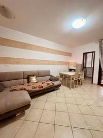 Trilocale con terrazza e posto auto