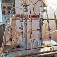 Riempitrice bottiglie liquori vino olio birra