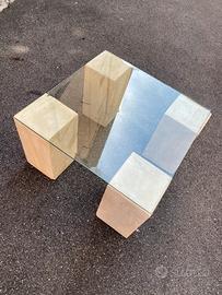 Tavolino in cristallo con base in pietra lavica