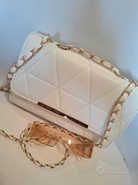 white cross bag