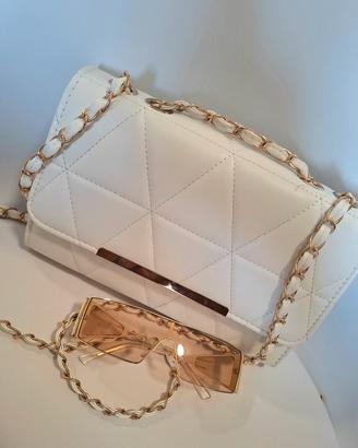 white cross bag