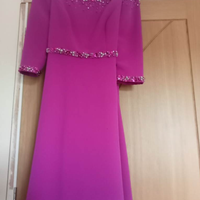 Abito e cappello coordinati per la madre della spo