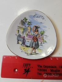 antico piattino in ceramica 