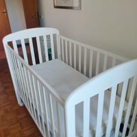 Lettino bambino con spondina regolabile e cassetto