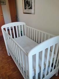 Lettino bambino con spondina regolabile e cassetto