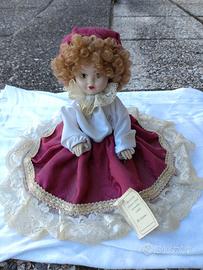 Bambolina in ceramica 