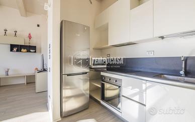 ATTICO CON GIARDINO PENSILE E GARAGE