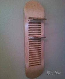 Skateboard da parete porta cd