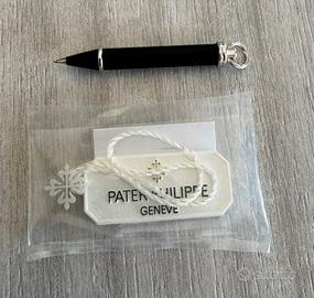 Patek Philippe correttore + tag imbustata