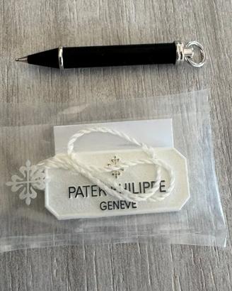 Patek Philippe correttore + tag imbustata