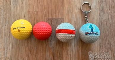 4 Palline da golf. 1 è un portachiavi