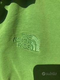 Polo verde di  The North Face taglia S