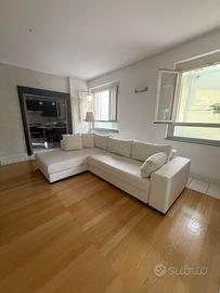Divano Letto a L ecopelle bianco